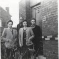 1945-Robert-Rhombs-WithAnnaJeanneParents-Glons-Belgium-002.jpg